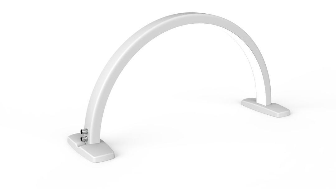 White GlowBow Nailmoon arch lamp at a nail workstation